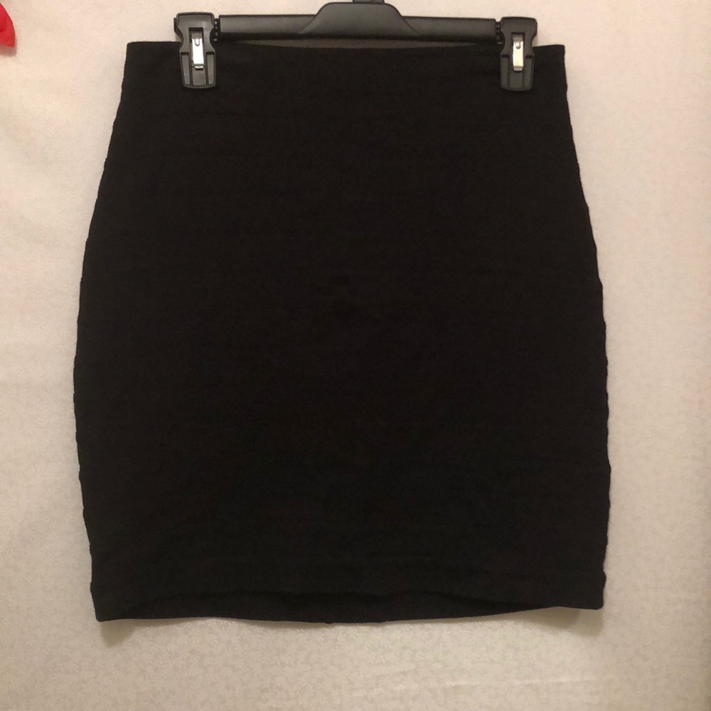 Cute bandage style black skirt.